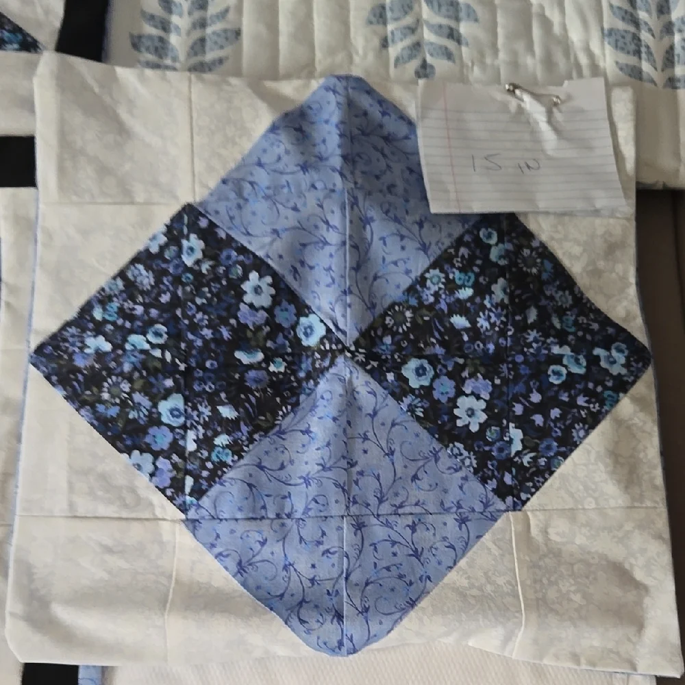 Blue and White Star Pattern Quilt